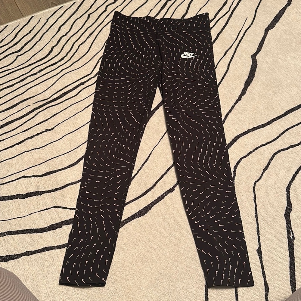 Nike swoosh leggings.  Size large girls.